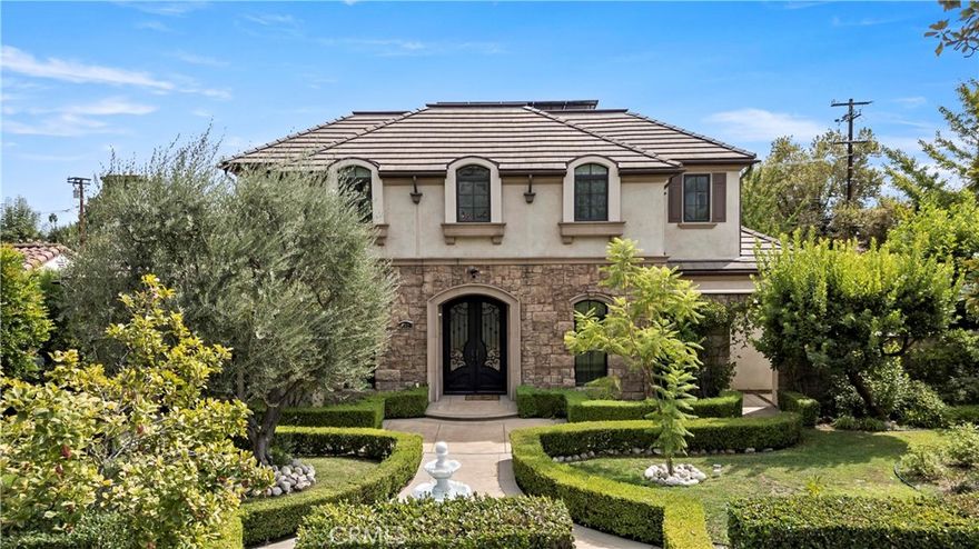 Welcome to 382 W Woodruff Ave, a luxury estate in prestigious Arcadia. Nestled on a quiet tree-lined street, this elegant home blends timeless design with modern comfort. The grand foyer with high ceilings and a sweeping staircase opens to bright living spaces, including a gourmet kitchen with top appliances and a spacious island. Multiple living and dining areas connect seamlessly to the landscaped backyard, perfect for entertaining.
The residence offers generous bedrooms, a master suite with spa-style bath and walk-in closet, plus a private office and media room. Outdoors, enjoy manicured gardens, sparkling pool, and patio for al fresco dining. Located in the award-winning Arcadia School District, minutes from the Arboretum, Westfield Santa Anita, and fine dining, this property is a rare opportunity to own a masterpiece in one of Arcadia’s most sought-after neighborhoods.