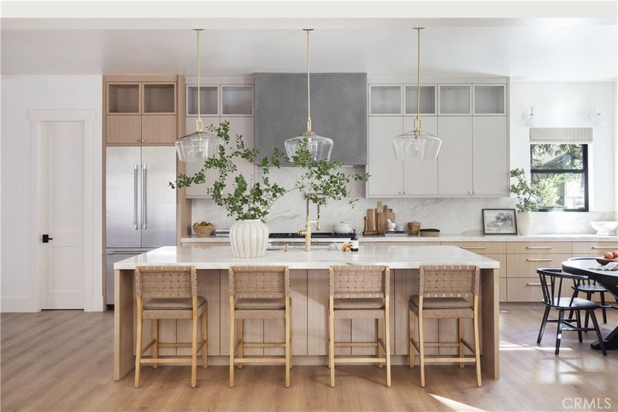 Located within the gated Meadow Shores community, this new construction home offers an exceptional Lake Arrowhead lifestyle with level access and an attached oversized extra deep two car garage with boat storage. Enjoy your walk down to lake access within the community to your brand new half double dock, included in the purchase price. Designed with quality and comfort in mind, the home features custom cabinetry, Taj Mahal quartzite countertops, and a premium Thermador appliance suite including a professional range and refrigerator. Additional upgrades include built in speakers throughout, a full camera security system, and a standby generator for year round peace of mind. The primary suite is conveniently located on the main level, creating an ideal layout for full time living or a refined mountain retreat. Upstairs, you’ll find an additional family room with bar, along with three more bedrooms, including another en suite. This newly built home blends modern finishes, thoughtful design, and access to one of Lake Arrowhead’s lakeside gated communities.