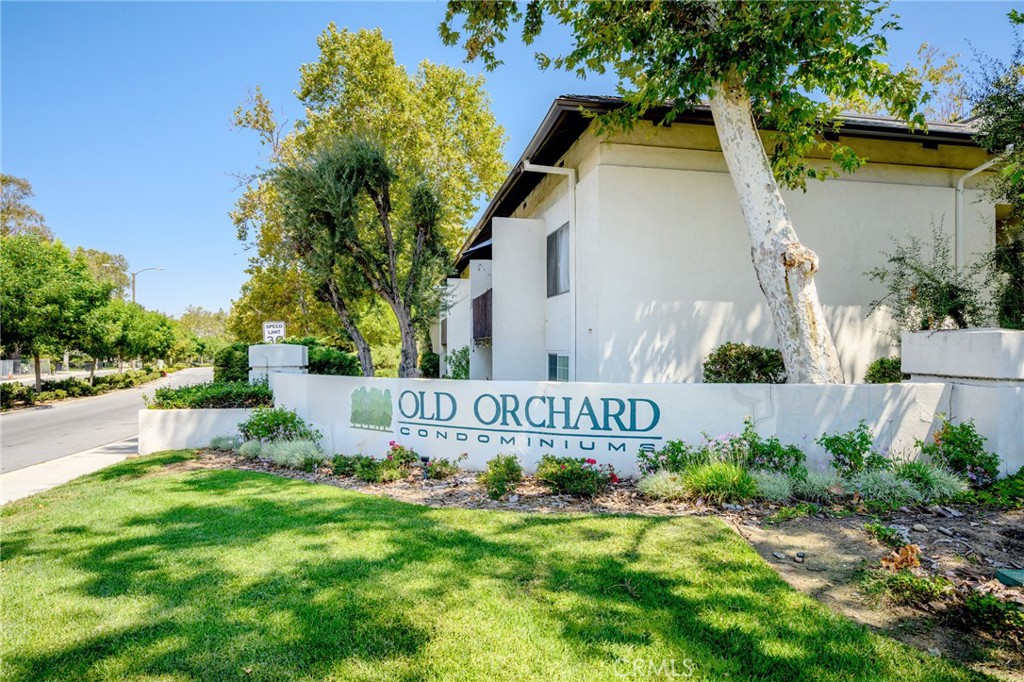 Welcome Home to this beautifully updated 1-bedroom, 1-bathroom condo in the desirable Old Orchard community. This light & bright ground floor unit offers a remodeled kitchen, a spacious living room with spot lights, built in sound system and private patio. Other upgrades include newer Central AC unit with nest thermostats, stunning engineered wood flooring through out, lots of closets and updated window and patio door . Enjoy resort-style living with access to two swimming pools, two tennis courts, a clubhouse, spa, sauna, exercise room, and on-site laundry facilities. This unit also includes a reserved carport parking space with more storage. Ideally located near Old Orchard Park, top-rated schools, shopping, restaurants, and with easy access to freeways, this condo offers both convenience and comfort in the heart of Valencia all at the least expensive condo for sale in Valencia