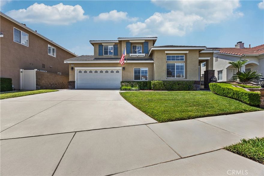 Stunning 5-Bedroom, 3 Bath Home with Pool & Spa in Highly Desired Corona. Welcome to this beautifully maintained 5-bedroom, 3-bathroom home offering over 2,862 sq. ft. of living space on a 6970 sq. ft. lot. The assessor reflects 4 bedrooms and 2.5 baths, but this home includes a versatile bonus room downstairs with a full bathroom—perfect for guests. PLUS an extra bonus room for office or a den or possible conversion to a 6th bedroom. The spacious kitchen features a breakfast area and granite countertops, opening to a generous family room with a cozy fireplace. Upstairs, you'll find 4 bedrooms, including a large primary suite with a walk-in shower and bath. Tile flooring runs throughout the upper level for easy maintenance and style. Laundry area is located upstairs for easy access. Step outside to your private backyard oasis featuring a sparkling pool with waterfalls, a grotto above the spa, a roomy dog run, outside BBQ kitchen area under a tropical-like palapa and a small putting green for golf enthusiasts. Located on a quiet cul-de-sac and near some of the best schools in the Corona-Norco School District, this home is in one of Corona’s most sought-after neighborhoods. This home has been lovingly cared for and is ready for its next chapter!
