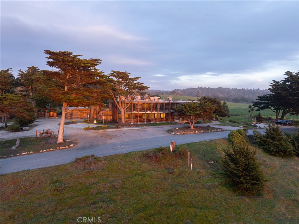 A one-of-a-kind investment on 3.05 acres along the stunning coastal landscape of Cambria, this property features a 6,662 sq. ft. restaurant space, a 2,453 sq. ft. private residence, and a 687 sq. ft. outbuilding. With its optimal location on Highway 1, high visibility, and direct ocean views, it's ideal for multiple revenue streams including fine dining, hospitality, or a private retreat. Key assets include expansive restaurant space with a commercial kitchen, a two-story home offering stunning views and an attached garage, plus additional versatile space for storage or events. Positioned in a high tourism area with potential for a luxury hospitality venture, high-end dining, or an oceanfront winery/tasting room. Infrastructure includes preliminary septic work, existing easements, and potential for parking and rock wall adjustments. This rare coastal property combines location, versatility, and development potential—making it a savvy investment for establishing a presence in one of California’s most desirable destinations. Make an appointment for a private tour.