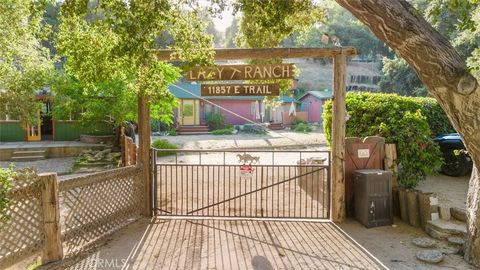 Photo of 11857 East Trail, Sylmar, CA 91342 (MLS # GD26106236)
