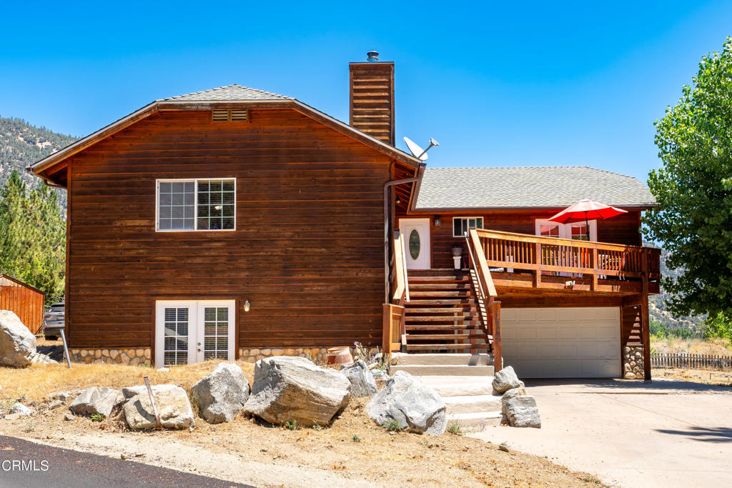 Priced to Sell-this beautiful 2 story mountain home is an a prime location. This property was build in 2003 and sits on a wonderful flat lot with a beautiful driveway. The property is walking distance to all Pine Mountain Club amenities. This home has two entries one upstairs and one downstairs. Beautiful views of the mountains can be observed from the wonderful deck area. The main upper level has a beautiful entrance that opens up to a large open concept living room and kitchen. The kitchen offers lots of cabinetry, island, along with a beautiful dining area with access to back yard. This property offers 3 bedrooms, as well as a master suite that comes equipped with a full bath, walk in closet, and French doors to the front deck. 2 bedrooms are located off of hallways along with a full bath, and laundry room, Downstairs you will find a very spacious den with French doors to the front. In addition, there is a 4th bedroom with a large full bath and large walk in closet. Large two car garage allows for plenty of storage room and parking. This home has many upgrades and would make a great home for any family!!