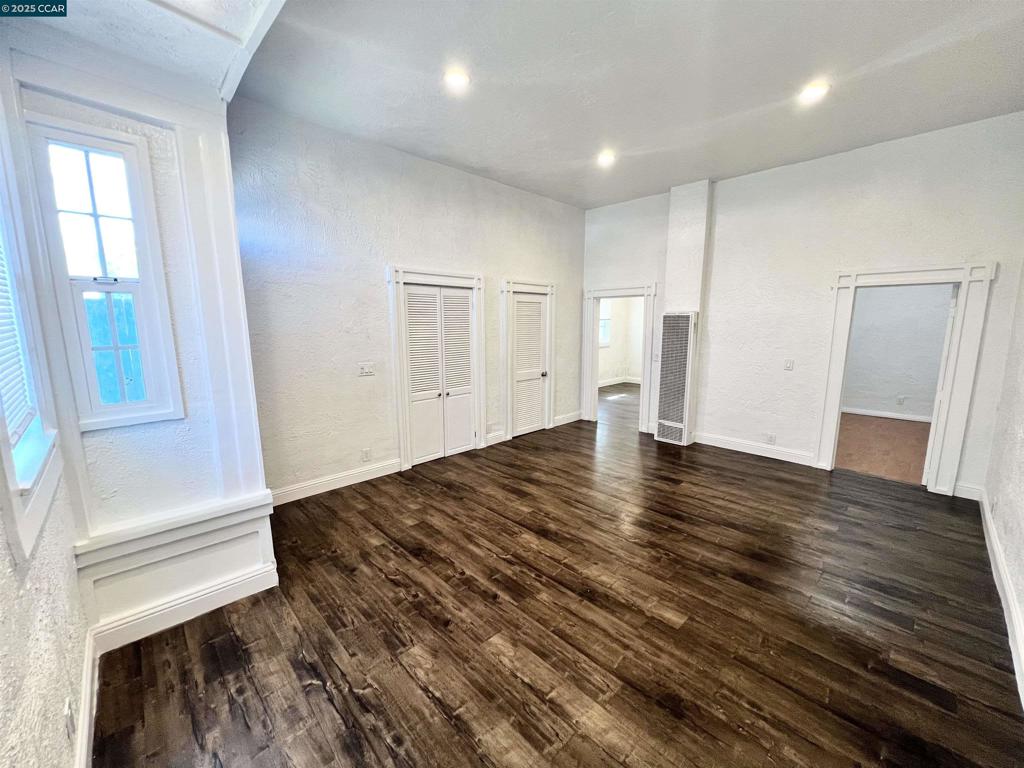Welcome to this bright and inviting 2-bedroom, 1-bathroom unit in a well-maintained West Oakland duplex, just blocks from the vibrant Prescott Night Market and the upcoming Prescott Market Hall. This thoughtfully designed home offers a cozy living space, a well-appointed kitchen, and comfortable bedrooms with bonus areas ideal for a home office or creative studio. Enjoy a spacious backyard, perfect for relaxing, gardening, or entertaining. With convenient access to downtown Oakland, major highways, and public transit, you'll love the ease of urban living in a neighborhood full of local culture and energy. Don't miss this opportunity to live in one of Oakland's most up-and-coming areas. Schedule a showing today!