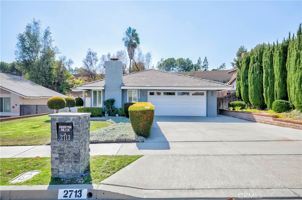 Highly upgraded single-story home featuring 3 bedrooms and 2 bathrooms. Beautiful stained-glass front door welcomes you into a bright and airy living space with hardwood flooring, recessed lighting, and a cozy fireplace. Recently Upgraded Bathrooms, The upgraded kitchen opens to a spacious backyard with covered patio and spa—perfect for entertaining. Dual-pane windows with wood shutters, newer A/C and water heater (approx. 3 years old), and solar panels for energy savings. Additional features include epoxy flooring in the 2-car garage with direct access, 220V EV charging, and excellent storage. Located in a great neighborhood with top-rated schools, and conveniently close to freeways, parks, shopping, and dining.