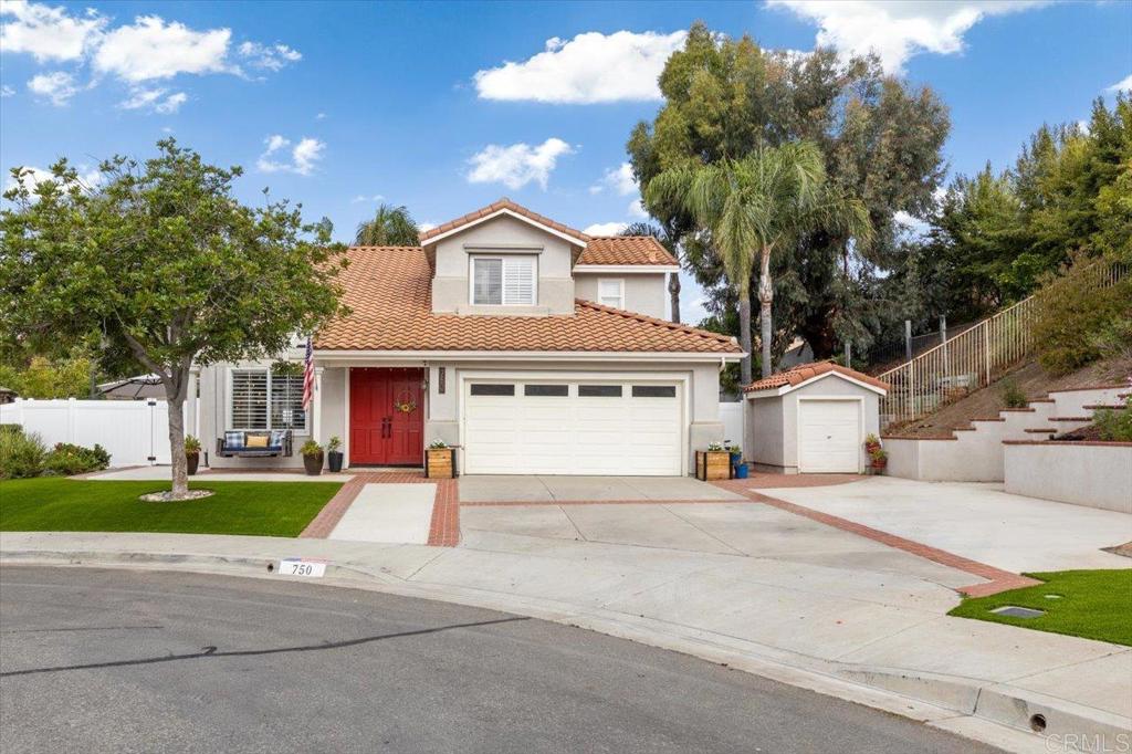 Welcome to this stunning, fully remodeled home in the sought-after Santa Fe Hills neighborhood! Nestled on one of the best cul-de-sac lots in the area, this home is sure to impress even the most discerning buyers. Step inside to discover a spacious, modern open-concept living and kitchen area, complete with gorgeous oversized Cali Bamboo vinyl plank flooring throughout. The gourmet kitchen is a true showstopper, with new appliances featuring luxurious Brazilian Quartzite countertops and a butcher block island. Every corner of this home has been meticulously upgraded, from the floating shelves set against striking counter-to-ceiling Spanish subway tile, to the sleek and sophisticated design. Why head to a coffee shop when you have your own cozy coffee/wine bar nook? The exposed wood beams and abundance of natural light create an inviting, airy atmosphere you'll never want to leave. A bedroom and full bathroom are conveniently located on the main floor—perfect for guests. Upstairs, a custom cable railing leads you to a converted loft space, ideal as a playroom, home office, or relaxation zone. Around the corner, you’ll find two additional bedrooms and the master suite. The master bedroom is a true retreat, with an entirely remodeled bathroom featuring a walk-in shower with a rain showerhead, a custom hickory wood vanity with dual sinks, and plenty of room to spread out. Step outside to your own private oasis, where no detail has been overlooked. A large pergola with lounge seating and BBQ area creates the perfect setting for outdoor entertaining. On warm SoCal days, cool off in the private saltwater pool area with Tiki hut and outdoor shower, or pick fresh lemons from your own tree to enjoy a refreshing drink. As the sun sets, gather around the built-in fire pit, seamlessly blending into the beautiful 70+ feet of cultured stone rock wall. This home is an entertainer's dream! For those with a green thumb, numerous planter boxes offer the opportunity to grow your own fresh, delicious produce. You will find spacious parking in the front yard with plenty of room for your toys, or for the kids to play.