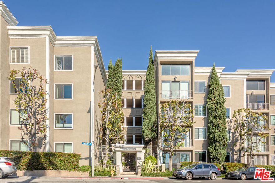 Welcome to this elegant, traditional-style condo nestled in one of West Hollywood's most coveted neighborhoods. Quietly positioned on the peaceful side of the building, this spacious residence showcases premium hardwood floors, intricate crown moldings, and custom built-in cabinetry throughout. The stunning eat-in kitchen is a chef's delight, featuring a cozy breakfast nook, Sub-Zero refrigerator, and top-of-the-line Viking appliances. A gracious formal entry leads to both a sophisticated dining room and a bright, inviting living room with French doors that open to a private terrace ideal for enjoying morning coffee or unwinding in the evening. The luxurious primary suite offers a generous walk-in closet and a spa-like bathroom, creating a true retreat. The second bedroom, currently configured as a den, provides flexible use as a guest room or home office, and also opens to the terrace through elegant French doors. Residents also enjoy access to the building's beautifully maintained amenities, including a private gym, sparkling pool & Spa's.