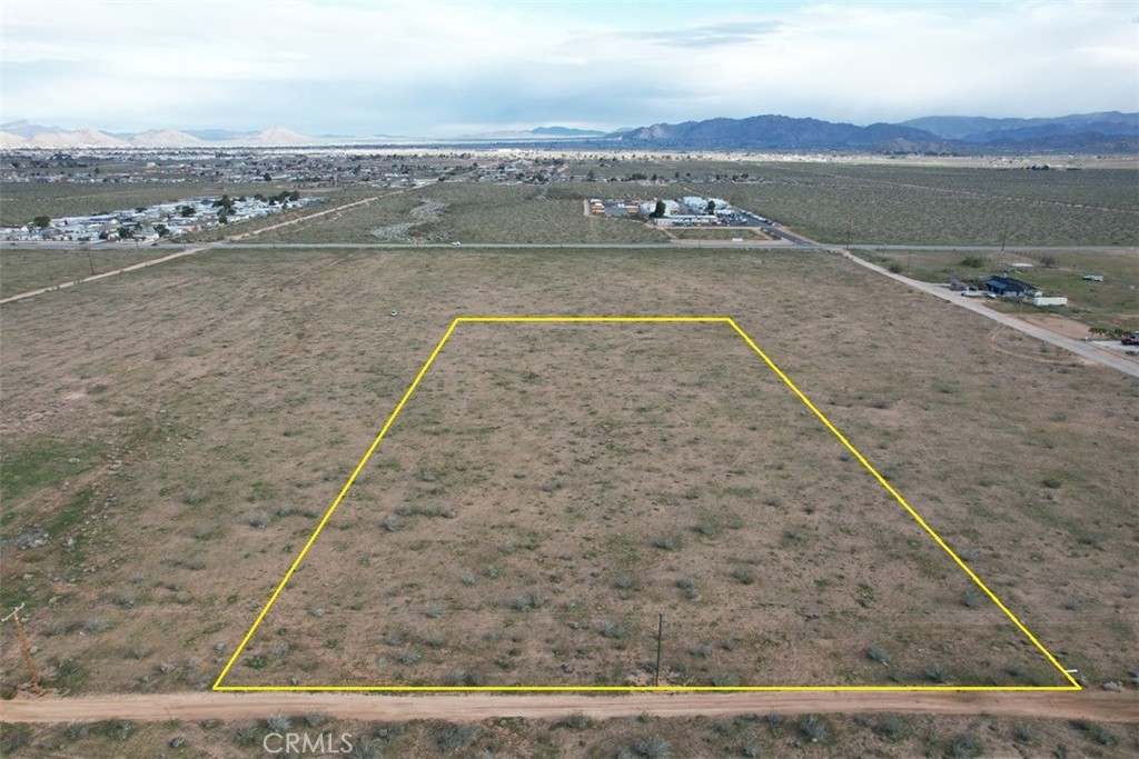 Prime Development Opportunity – Bear Valley Rd Frontage
Presenting 4 acres of pristine desert land with breathtaking views, ideally located on Bear Valley Road — a major thoroughfare connecting the High Desert’s tri-city region of Apple Valley, Victorville, and Hesperia. This high-visibility site is well suited for multifamily development and more (Buyer to verify).
Adjacent to this parcel, in the front, is an additional 4.1-acre lot (APN: 3080-032-16) zoned General Commercial (GC). Together, these two parcels total 8.1 acres, offering a unique opportunity for a 175-unit apartment complex (Buyer to verify all development potential and zoning requirements with local authorities).
Property Highlights:
- Total Combined Area: 8.1 acres (4.0 acres + 4.1 acres)
- Zoning: Rear lot ideal for multifamily (Buyer to verify); Front lot zoned GC (APN 3080-032-16)
- Location: Frontage on heavily trafficked Bear Valley Rd
- Development Potential: Up to 175 multifamily units (Buyer to verify)
- Sale Options: Parcels can be sold individually or together
This offering is a rare opportunity for developers and investors to acquire a large, versatile site in one of the most dynamic growth corridors of the High Desert.