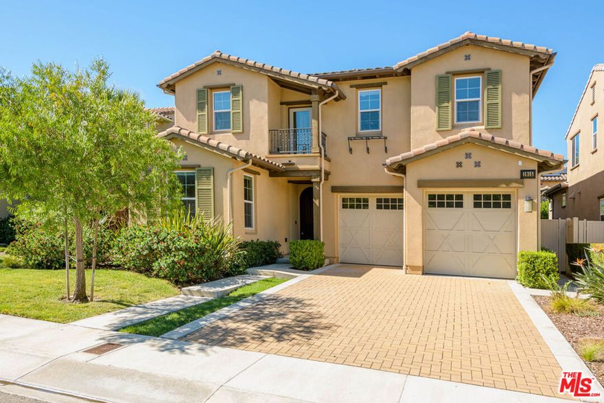 Welcome to The Faircrest! This boutique gated community is centrally located in Los Angeles and minutes away from Culver City, Koreatown and Mid-Wilshire, also a short drive away for DTLA or West LA commuters. Enter into a beautiful foyer featuring an enchanting circular wrought iron staircase system and beautiful wood tread stairs. Gorgeous custom designed features that include chef's kitchen professional GE Monogram appliances, built-in 48" Range, additional wall oven, microwave, and dishwasher. Huge center island with porcelain farmhouse sink opens to family room with fireplace and dining room. White Shaker style cabinetry with granite center island. Huge tri-sliding glass door to private backyard. Brushed Nickel hardware, plumbing fixtures, and coordinating bath hardware, throughout. Master bath features 6' soaking tub, and extra-large shower with seat with 2 generous walk-in closets.