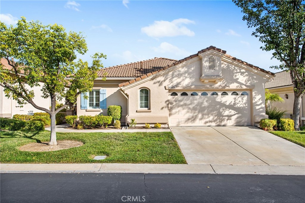 Welcome to 40006 Via Graziana, a beautifully maintained single-story home in the highly desirable 55+ gated community of The Colony at California Oaks. Offering 3 bedrooms, 2 bathrooms, and a thoughtfully designed floor plan spanning approximately 2,100 sq. ft., this home combines comfort, convenience, and style.
Inside, you’ll find soaring vaulted ceilings and an open layout that creates a bright, inviting atmosphere. The spacious living areas flow seamlessly, making it perfect for both everyday living and entertaining. The primary suite offers a peaceful retreat with ample space and a well-appointed bathroom, while the additional bedrooms provide flexibility for guests, an office, or hobbies. A private backyard allows for relaxing or enjoying your morning coffee in a serene setting.
The Colony is known for its exceptional lifestyle amenities, including a resort-style pool, two spas, tennis and pickleball courts, and beautifully maintained common areas. The clubhouse features a fitness center, library, billiards, beauty salon, and multiple craft and hobby rooms. Nestled around the California Oaks Golf Course, residents can also enjoy scenic views and discounted play. HOA services cover 24-hour guarded gate security for peace of mind.
Don’t miss the opportunity to make this well-cared-for home yours and experience all that The Colony has to offer!