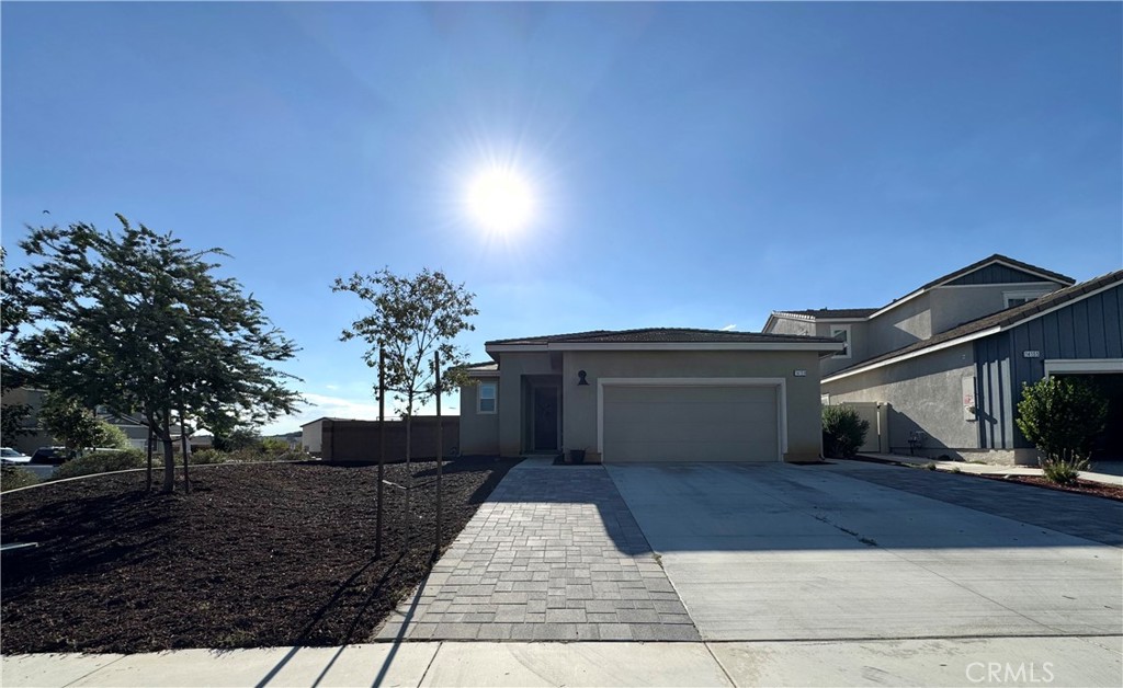 Welcome to this spectacular single-story family home inside the highly sought-after Olivewood gated community. From the moment you step inside, you are greeted by an open floor plan with soaring ceilings, elegant crown molding, and shutters throughout the entire home. This residence offers three spacious bedrooms and two and a half bathrooms, designed for both comfort and style.
The home is thoughtfully equipped with premium features including a paid-off solar system, a whole-home water softening system, a tankless water heater, and rain gutters. The extended driveway provides ample parking space, while the desirable backyard offers a partially landscaped setting with plenty of potential to create your dream outdoor retreat. Sitting on a premium corner lot at the end of a cul-de-sac, this home offers both privacy and curb appeal.
Conveniently located between the 10 and 60 freeways, commuting is effortless. The Olivewood community elevates the lifestyle with two resort-style pools, a beautifully designed clubhouse, fire pits, parks, scenic walking trails, and sports courts for both basketball and volleyball.
This home blends luxury, functionality, and location into one exceptional opportunity. Don’t miss the chance to make this your future home. Schedule your private tour today!