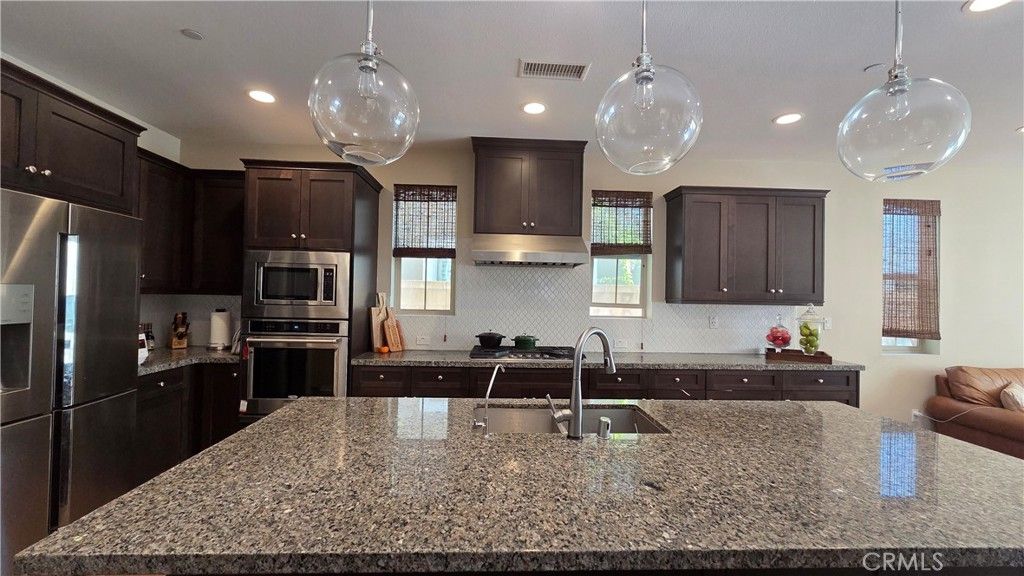 Photo of 136 Brambles, Irvine, CA 92618 (MLS # OC25276032)