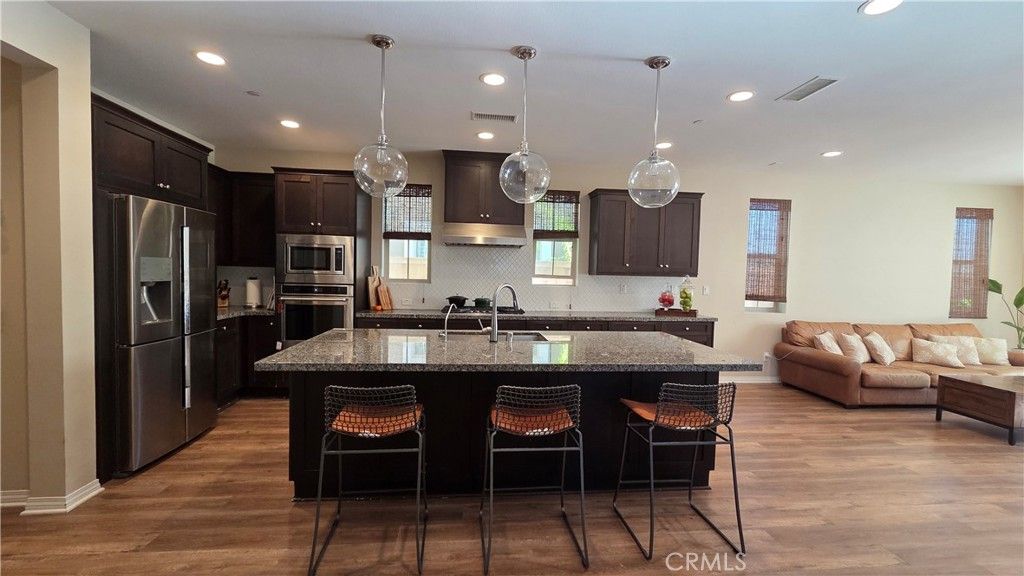 Photo of 136 Brambles, Irvine, CA 92618 (MLS # OC25276032)