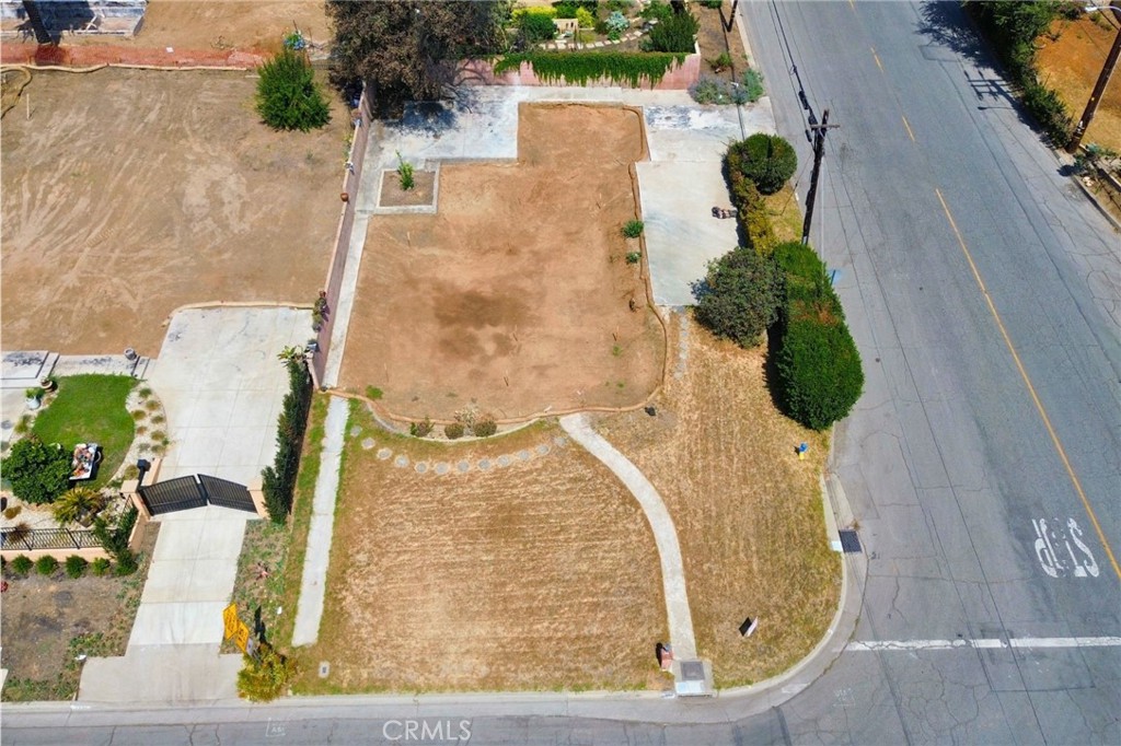 287 E Calaveras Street is a prime corner lot located in the heart of Altadena, offering an exceptional opportunity to build a custom residence in a sought-after neighborhood. With generous frontage and excellent accessibility, the parcel provides flexibility for a variety of architectural styles and designs. Surrounded by established homes, tree-lined streets, and just minutes from scenic hiking trails in the San Gabriel Mountains, the property blends the charm of a close-knit community with the beauty of natural surroundings. Its convenient location also provides easy access to Pasadena, the Rose Bowl, local shops, and dining. Whether you envision a modern design, a classic craftsman, or a custom retreat, this lot serves as the perfect canvas to create a new home in one of Altadena’s most desirable areas.