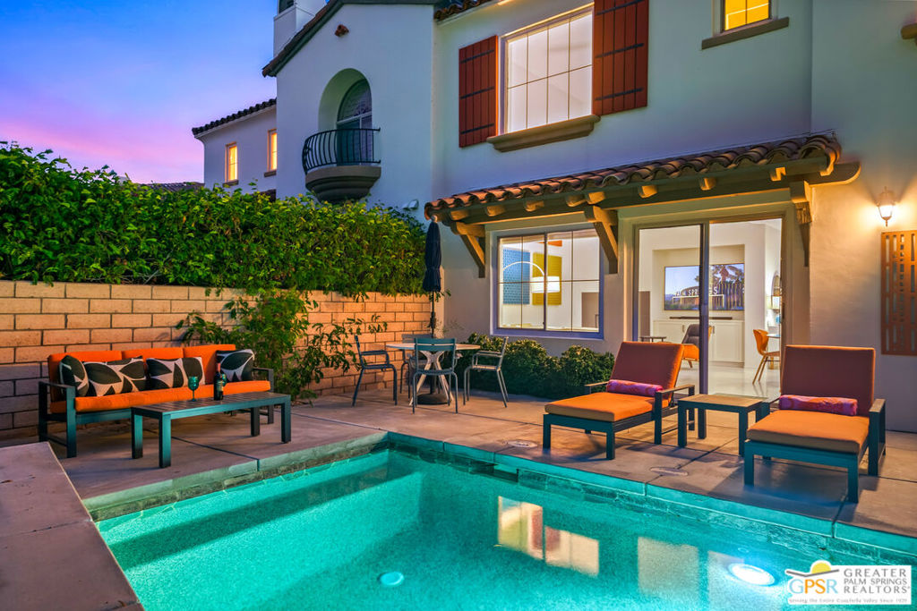 Special Opportunity in Tuscan inspired resort style Tierra Hermosa! This stunning remodeled end-unit townhouse has its own private pool and spa and is offered turn-key furnished, just in time for season! Flooded with natural light, the dramatic great room has two story walls to showcase your prized artwork plus fireplace opening seamlessly to a private backyard with pool and spa, delivering the indoor/outdoor lifestyle. The bright kitchen features timeless finishes and stainless-steel appliances, while coveted terrazzo flooring adds sophistication throughout. A den off the great room creates expansive living space or offers flexibility as a third bedroom, with a full bath conveniently located downstairs. Upstairs, the primary bedroom has ensuite bath, walk-in closet and mountain views. Secondary bedroom is ensuite for privacy. Professionally designed interiors showcase bold accent walls and high-end furnishings sourced from West Elm, Restoration Hardware & Anthropologie (to name a few) . A dedicated laundry room and two car garage complete the space. Tierra Hermosa is a charming, gated community featuring two pools/spas, BBQ areas, dog park, and lush well-manicured landscaping in the heart of Palm Springs. HOA dues cover cable/internet, trash, and more. 30-day minimum rentals. Situated in a prime central location, you're just minutes away from world-class dining, shopping, and the vibrant Palm Springs lifestyle! Call to schedule your private showing.