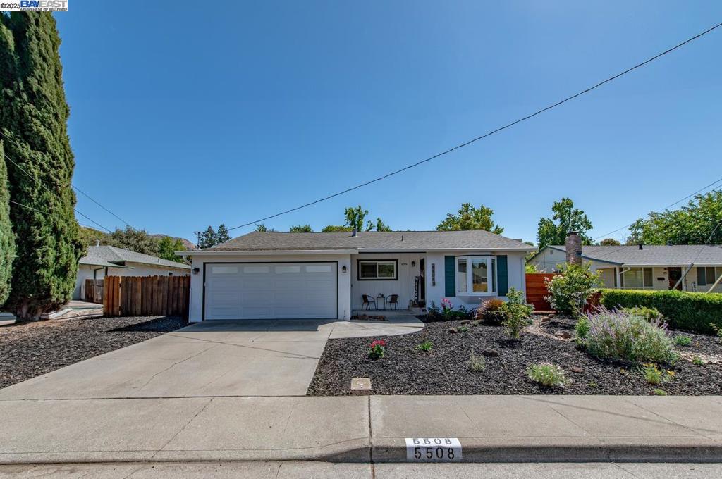 Welcome to this beautifully updated single-level home located in a quiet and established Concord neighborhood. Offering 3 bedrooms and 2 bathrooms across 1,158 square feet, this turn-key property blends charm and comfort with modern touches. Mitsubishi split system for heating and air! Bright and airy living space featuring a delightful bay window adding warmth and character, complemented by neutral flooring and soft off-white walls. Ample space for formal dining, ideal for hosting gatherings or cozy family meals. The kitchen is a showstopper; light, welcoming, and thoughtfully designed with custom white cabinetry, white stone countertops, stainless appliances, and barstool seating. Primary suite offers both comfort and convenience, featuring its own ensuite bathroom and direct access to the manicured backyard. Outside, discover a beautifully landscaped retreat with a stone pathway, wooden patio, colorful blooms, mature fruit trees, and a striking Japanese maple tree. Room for RV Parking!! Multiple raised planter beds are already flourishing with crops like tomatoes, corn, squash, and more. This home is completely move-in ready with every detail carefully considered. Don’t miss your chance to own this Concord gem!!