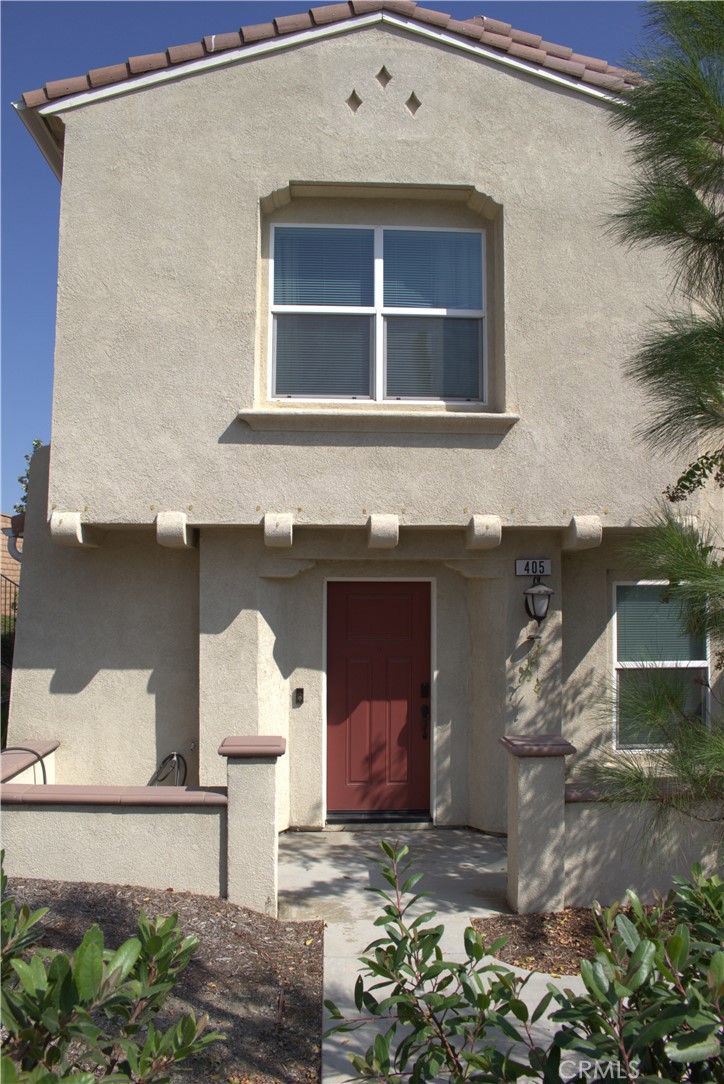 Nestled in the El Paseo Gated Community in North Fontana, this energy efficient home built in 2021 features a spacious great room design and a modern kitchen with white cabinets and a large island and dining area. There are 3 bedrooms, a loft, 2 full baths upstairs and 1 half bath downstairs. The Master bedroom includes a walk-in closet and ensuite.  All bedrooms have ample layouts, and are light filled with partial views of the mountains. The laundry room is conveniently located upstairs.  There are 2 thermostats, one upstairs and one downstairs for your convenience and comfort.  The 2-car garage has a tankless water heater, and 220-volt connections to accommodate your EV vehicle.  Home access from the garage. This home includes a paid in full/no lease SunPower 3KW Solar System.  What sets this property apart is the prime corner end location that makes this home private and includes an ample side yard with room to entertain or let your pets run around.  Ideal access to community amenities includes a lovely community pool, spa, clubhouse, BBQ Area, half-court basketball court and parks tot lot.  This is an FHA approved community. *Major bonus* The property is still covered under the builders’ 10-year limited warranty (Expires 2031).