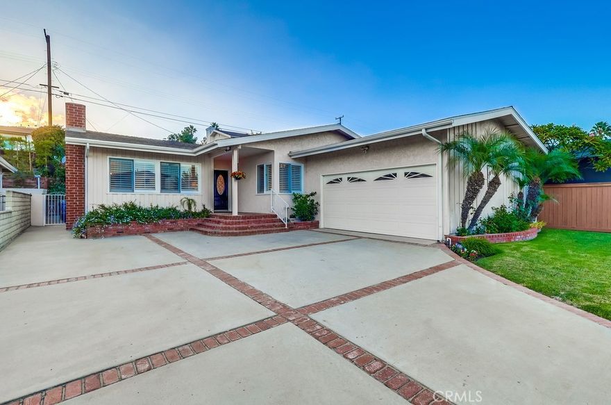 Nestled on a peaceful, flat street in the highly sought-after Miraleste Pines neighborhood, this cherished family home is hitting the market for the first time in 55 years. Lovingly maintained by the same family since 1970, this is more than just a house — it's a place where generations have grown up, celebrated milestones, and built lasting memories. Now it's ready for its next chapter. From the moment you arrive, the home's inviting curb appeal and well-manicured front yard make a lasting impression. A classic covered brick porch sets a warm tone as you step inside to a formal living room anchored by a traditional fireplace and a cozy breakfast nook, perfect for quiet mornings or catching up over coffee. Throughout the home, original oak hardwood floors add warmth and timeless charm. A spacious, sun-drenched family room at the rear of the home features vaulted ceilings, a designated dining area, and direct access to the backyard via sliding glass doors — ideal for seamless indoor-outdoor living. With the holidays just around the corner, there's still time to settle in and host your first gathering in this generous family space. Whether it's holiday dinners, game nights, or weekend celebrations, the family room offers the perfect setting to bring everyone together. The beautifully upgraded kitchen is a cook’s dream, featuring custom cabinetry, granite countertops, stainless steel appliances including a Viking range, and a convenient breakfast bar for casual dining. The main hall offers excellent storage with multiple closets, leading to the primary suite with its own private 3/4 bath. Two additional bedrooms are well-sized and share a full hall bath. Plantation shutters, central heating and air conditioning, and copper plumbing (buyer to verify) provide comfort and peace of mind. The attached two-car garage includes direct access to the interior, along with a designated laundry area. Outside, the private backyard is designed for easy maintenance yet spacious enough for weekend barbecues, entertaining guests, or simply enjoying the Southern California sun. An expansive driveway offers additional off-street parking. This is an opportunity to own a true pride-of-ownership property in a prime location — a home filled with history, love, and endless potential. Move in just in time to make your holiday memories here.