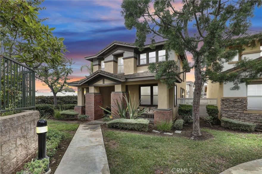 Step inside this beautifully elegantly enhanced two-story home, ideally situated on a premium end lot in the highly prestigious Amerige Heights community. Offering 3 bedrooms, a spacious loft that can easily serve as a family room or home office, and 2.5 elegantly enhanced bathrooms, this move-in ready residence boasts a smart and functional layout perfect for modern living. Designed for both comfort and style, the home features tasteful engineered wood flooring throughout, complemented by crown molding, recessed lighting, plantation shutters, and a built-in speaker system. The bright and open kitchen is equipped with quality stainless steel appliances, including a 5-burner stove, granite countertops, abundant cabinetry, and a large center island—ideal for casual dining or entertaining. Upstairs, the generous primary suite offers double-door entry, a walk-in closet, and a thoughtfully upgraded bathroom with a soaking tub, modern tile flooring, and marble countertops. All bathrooms have been updated with quality finishes and attention to detail. Enjoy outdoor living with an inviting front porch and spacious side yard, perfect for weekend BBQs or relaxing with family and friends. Set within a vibrant community surrounded by well-maintained parks, recreational areas, and just a short walking distance from award-winning schools (Robert Fisler Elementary and Junior High, and Sunny Hills High School), this home also offers easy access to the popular Amerige Heights Town Center, filled with shopping and dining options. HOA amenities include high-speed internet, tennis courts, and a clubhouse, elevating the lifestyle and convenience this community provides. With an unbeatable combination of comfort, community, and convenience, this home is truly a place to call your own. Discover the exceptional lifestyle awaiting you here.