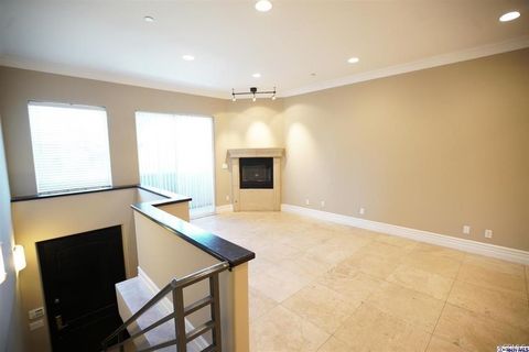 Photo of 18245 Burbank Blvd #110, Tarzana, CA 91356 (MLS # GD26066826)