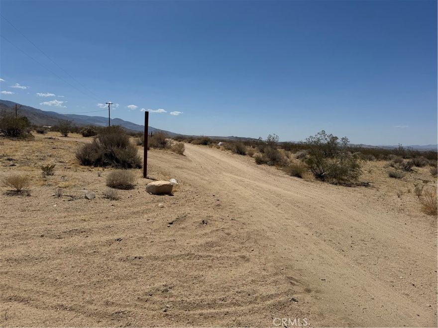 NOW 1/2 off!  just lowered the price on this 5 Acres  vacant land with breath taking views of the desert and the mountains.  Relax and enjoy the starry nights, star gazing, or use it as vacation spot.  Unobstructed  views of the mountains and desert. Conveniently located close  to downtown Yucca Valley, Joshua Tree National Park with fantastic hiking trails  or Big Bear Mountains with ski resort and Big Bear Lake.
