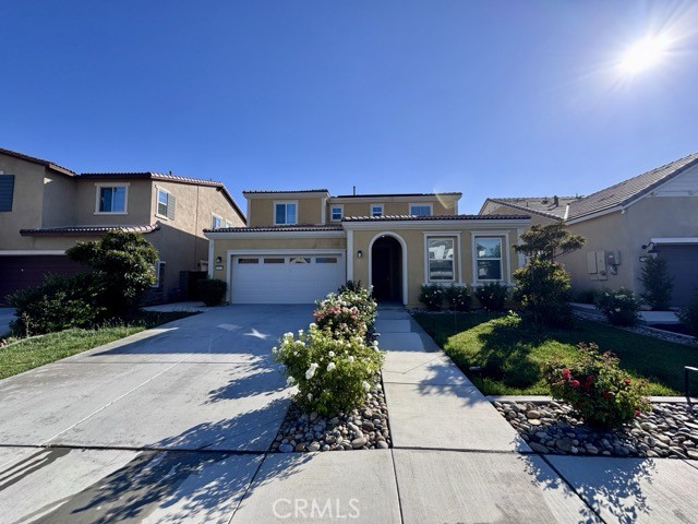 Welcome to this inviting 4 bedroom 3 bathroom two story home in Menifee’s sought after Heritage Lake community! Outfitted with solar panels and a two car garage, the residence combines comfort, style, and efficiency. Inside, a light, neutral paint palette complements rich plank flooring for a bright, cohesive feel. Just off the entry sits a main level bedroom with an adjacent full bath making it ideal for guests, or a private office. Farther in, the main floor opens to a formal dining room, an airy family room, and an expansive kitchen designed for entertaining. The kitchen features abundant cabinetry, generous counter space, a large island with bar seating, updated light fixtures, a pantry, and clear sightlines to the living areas including the family room and formal dining room. Upstairs, a versatile loft anchors the remaining bedrooms and a convenient laundry room. All bedrooms are comfortably sized, while the impressive primary suite showcases an oversized space and an ensuite bathroom with a walk-in closet, dual sinks, a soaking tub, and a separate shower. The backyard is low-maintenance yet spacious, framed by attractive landscaping and offering plenty of room for enjoying and relaxing. Residents of Heritage Lake enjoy resort-style amenities: a pool and spa, clubhouse, fitness center, lake access, parks, playgrounds, and scenic walking trails. Plus, the community’s location provides quick access to the 215 freeway, local schools, and everyday shopping and dining. Schedule your showing today and discover why this Heritage Lake gem is the perfect place to call home!