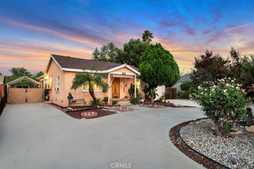Something Special Awaits! Welcome to 8336 Tunny Avenue, a charming single story home located in a highly desirable neighborhood, just minutes from shopping at Costco or Northridge mall, dining, CSUN and more. A circular driveway welcomes you to this thoughtfully expanded 3 bedroom, 2 bath residence situated on an expansive approx. 9,500 sq. ft. lot. One of its standout features is a permitted attached workshop/studio (not included in the advertised square footage), which is connected to the two car garage. This versatile space offers endless possibilities, whether you're envisioning a future ADU, a creative studio, a home office, or an extension of the main living area. Inside, the home boasts central air and heat that’s just two years old, copper plumbing, smooth ceilings, recessed lighting, etch glass throughout, a Ring security system with cameras, and tile flooring.  The cook’s kitchen has granite countertops, updated cabinetry, bay window and a built-in refrigerator. The primary suite is a relaxing retreat featuring wood-look laminate flooring, a large walk-in closet, a full bathroom, and direct access to the backyard through sliding glass doors. The backyard is designed for both entertaining and relaxing, offering low-maintenance landscaping, a covered patio, an above-ground spa, a horseshoe pit, an axe-throwing area, two storage sheds, drip irrigation, and mature fruit trees. Parking is plentiful, with dual driveways on either side of the front yard, a long gated driveway, and an attached two-car garage. Homes with this kind of flexibility, character, and potential don’t come on the market often. Don’t miss your opportunity to make this unique property your own!