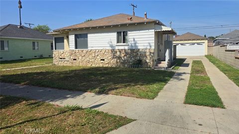 Photo of 1613 E Ezmirlian St, Compton, CA 90221 (MLS # SR26065102)
