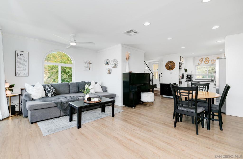 Beautifully Updated End-Unit Townhome in Prime Santee Location with VA Assumable Loan option. This light and bright 2 bedroom, 2.5 bathroom townhome offers added privacy as an end-unit, mountain views, and abundant natural light throughout. The modern interior features updated flooring, stylish fixtures, and a contemporary kitchen with sleek finishes. Enjoy the convenience of a two-car attached garage, indoor laundry & The open floor plan with half bath on the main level make it ideal for entertaining. Located in the heart of Santee, you’re just minutes from shopping, dining, parks, and major freeway access. A perfect blend of comfort, style, and location—don’t miss out on this opportunity! Broker and Broker's Agents do not represent or guarantee accuracy of the square footage, permitted or unpermitted space, bd/ba count, lot size/dimensions, schools, or other information concerning the conditions or features of the property. Buyer is advised to independently verify the accuracy of all information through personal inspection & w/ appropriate professionals to satisfy themselves.