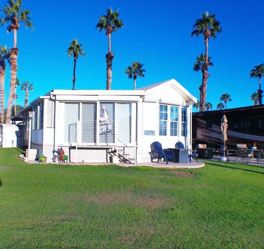 Wonderful Park Model located on the 10th Fairway with Mtn, Water and Golf Course Views. Enclosed semi-CA Room for more living space. Covered Parking and great Shed. Outstanding views of the 1st & 10th Golf Holes with a pond and aerator fountain. Views of the San Jacinto Mtns in background. Steps away from Club House 2, pool, spa Golf Pro Shop, lighted tennis courts.