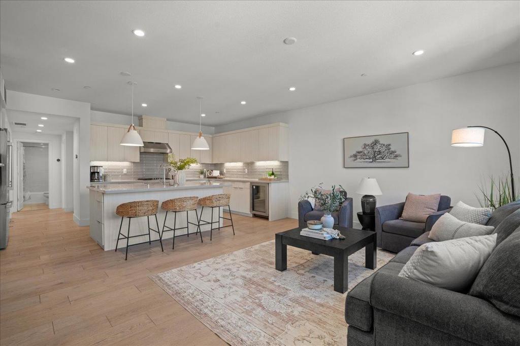 Welcome home to an elite living experience in the sought after Bellaterra community! Discover modern luxury in this top-level residence, built by award-winning SummerHill Homes and ideally situated in the heart of Los Gatos. This stunning 2-bedroom, 2-bathroom condo features an open floor plan with exquisite design elements throughout. The bright and inviting kitchen is equipped with premium Bosch appliances, sleek cabinetry with thoughtful storage features, quartz countertops and large center island. The primary suite offers private luxury featuring a walk-in closet, separate toilet room, dual sink vanity and gorgeous stall shower with a large bench. Additional features include tankless water heater, nest thermostat, custom window treatments including blackouts in the bedrooms, in-unit laundry and private balcony. The Bellaterra community offers thoughtfully curated amenities including parklets, community gardens, a firepit park, hammock zone and BBQ areas. Located just minutes from vibrant downtown Los Gatos, Vasona Park, Los Gatos Creek Trail, top-rated schools, shopping, and dining, with easy access to Highways 17 and 85 for a quick commute to Silicon Valley.