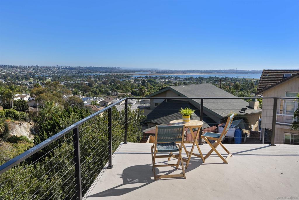 Wake up to panoramic Bay, city, & ocean views in this 4-bed, 4-bath Pacific Beach home! Main living with water views & wrap around view deck. Additional Bay and ocean views from primary bedroom on top floor. 3 bedrooms on the top floor & 1 bedroom on main level. Studio w kitchen & bath on bottom floor. Newer roof, kitchen appliances, freshly painted interior/exterior w designer colors, upgraded flooring & fixtures, & wet bar perfect for entertaining. attached 2 car garage. Close to Mission Bay, I-5 freeway, shopping, restaurants, and schools!