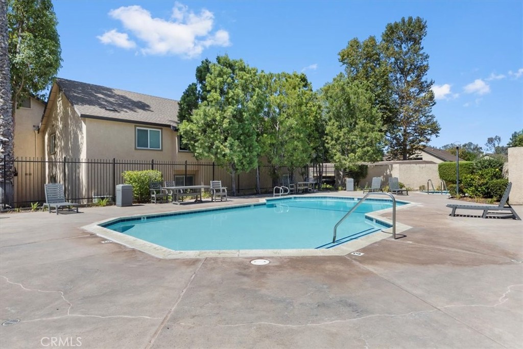 Welcome to your Lake Forest retreat! This spacious 2-bedroom, 1-bathroom condo is situated poolside and just steps from the clubhouse, making this home perfect for both entertaining and everyday relaxation. Step inside to find a large living room with an open layout that flows seamlessly into the dining and kitchen areas. The kitchen features granite countertops, a private pantry, and plenty of storage for all your cooking needs. Enjoy the convenience of washer and dryer hookups inside the unit, along with central heating and air conditioning to keep you comfortable year-round. Unwind in your private, secluded patio—a perfect spot for morning coffee or evening gatherings. The grounds are beautifully maintained, creating a peaceful and inviting atmosphere throughout the community. With its prime location, poolside views, and thoughtfully designed floor plan, this condo truly has it all. Whether you’re looking to entertain guests or enjoy quiet nights at home, this property offers the perfect balance—all just minutes from premier shopping, dining, award-winning schools, Irvine Spectrum, scenic Orange County beaches, and the trails of Whiting Ranch Wilderness Park.
