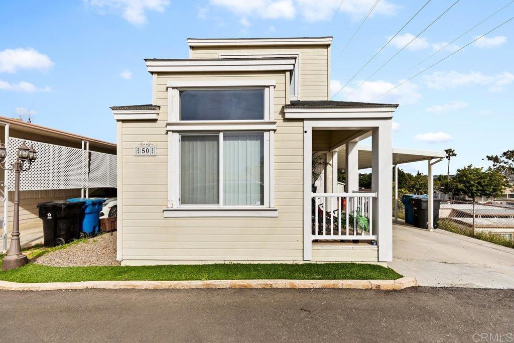 Nestled in a prime location within the community, this custom-built, two-story mobile home boasts views of the South Bay and an abundance of natural light, offering a unique sense of privacy. The layout is perfect for easy access to the master bedroom on the lower level, while two additional bedrooms reside on the second floor. This gorgeous home features three beds, two baths, vaulted ceilings, a large living room, and a convenient laundry room. The spacious master suite includes yard access, complemented by parking for two cars and a relaxing front porch. Located in the well-maintained Don Luis Estates—one of Chula Vista's finest all-age communities—residents enjoy amenities like a swimming pool, clubhouse, and beautifully landscaped surroundings, with convenient access to shopping, dining, highways, parks, and schools.