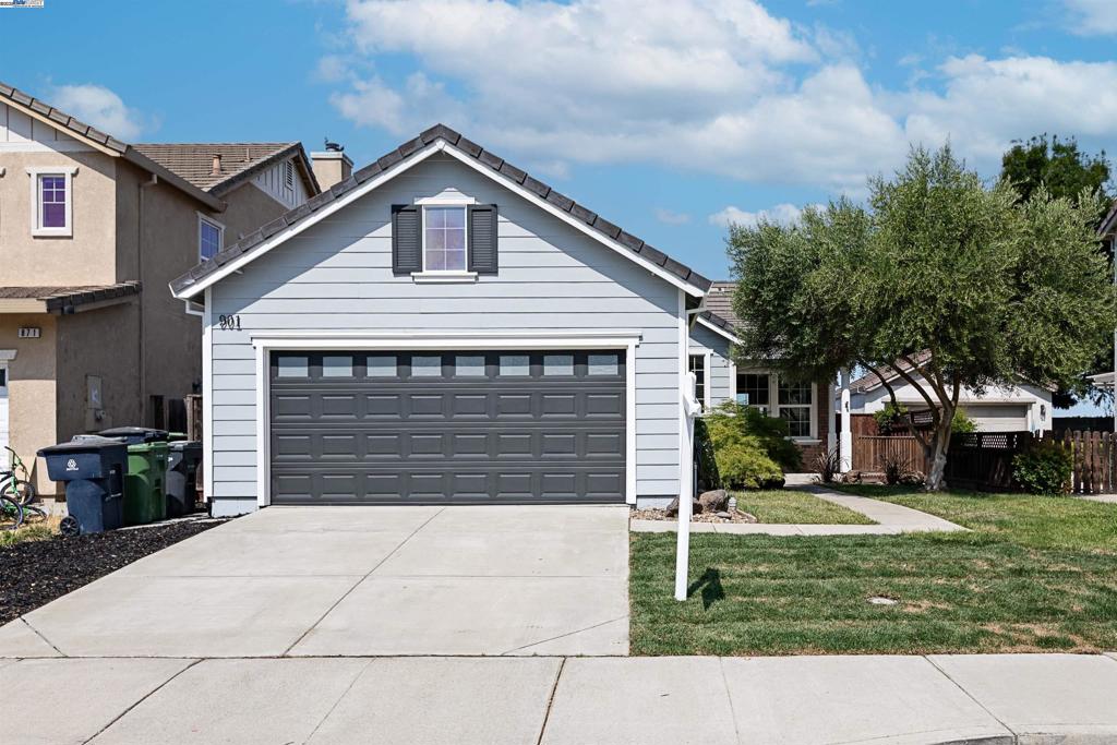 Open House: Saturday, June 28th @ 11-2pm & Sunday, June 29th @ 1-4 pm ABSOLUTLEY GORGEOUS! Located in a quiet, family-friendly corner of Tracy, this charming 3-bedroom, 2-bathroom single-family home spans 1,518 sqft on a 4,846 sqft low-maintenance lot. Built in 2002 and recently updated, the property offers comfort, convenience, and move-in readiness. The home features a welcoming flow between living, dining, and kitchen areas—ideal for casual living or cozy gatherings. Generous natural light with large windows brighten the main spaces and provide a warm, open ambiance. Enjoy a low-maintenance yard: Perfect for those preferring minimal upkeep with room for outdoor leisure or gardening. This beautiful home is located in a quiet neighborhood near parks, trails and great for evening strolls. Ideal for families and active lifestyles. Close access to major highways. Excellent schools within the Tracy Unified School District. A MUST SEE!