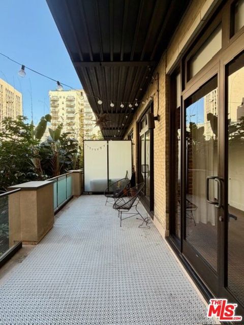 Photo of 460 S Spring Street #205, Los Angeles, CA 90013 (MLS # 25628547)