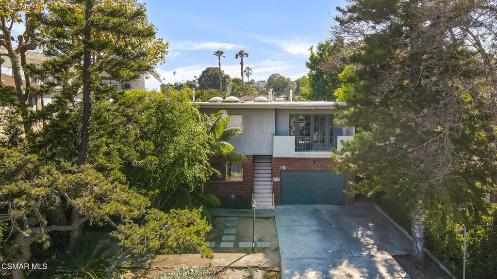 Nestled in the desirable Mar Vista neighborhood, known for its beach proximity and small-town vibe, this quadruplex offers a rare combination of a spacious owner's unit, private living spaces for tenants, and fantastic income potential. This is a must-see property for investors or those looking for a multi-generational home with rental income.The main unit is a sprawling 4-bedroom, 2.5-bathroom ground-level home with over 2,000 sq ft of living space. A perfect blend of comfort and luxury, it includes a cozy family room, a formal dining room, and an attached garage. Step outside to your private, Zen-like yard--a peaceful retreat for outdoor dining, relaxation, or gardening.The three 2-bedroom, 2-bathroom units offer privacy and serenity, with no shared walls, ensuring quiet, independent living for tenants. Each unit features private garages and access to an on-site laundry facility, providing added convenience. Expansive tree-top views from every unit enhance the feeling of space and tranquility, making these homes both beautiful and functional.Just minutes from Venice Beach, Santa Monica, local shops, and top-rated schools, this property provides the perfect balance of comfort, investment opportunity, and prime location. Whether you're looking to occupy the main unit and lease the rest or expand your portfolio with reliable rental income, this quadruplex has everything you need.