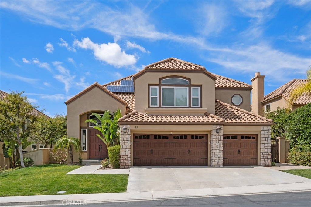 Dove Canyon Dream Home! Available for lease in the exclusive, guard-gated golf course
community of Dove Canyon, this stunningly remodeled home promises unparalleled comfort,
style, and the best in resort-style living. The desirable location unlocks a sought-after lifestyle,
with neighborhood amenities that include a Junior Olympic size pool, spa, tennis courts, and
exclusive access to parks, horse and hiking trails. Step inside to the home’s airy and updated
living spaces, where a 3-car garage and grand covered entry ushers you into an open-concept
living and dining room. Completely remodeled, the gourmet kitchen showcases a dramatic
update with gleaming countertops, contemporary lighting, white Shaker cabinetry, and a suite of
top-of-the-line appliances to satisfy any home chef. Enjoy flexibility for casual meals and
entertaining, with both a large breakfast bar island and a sunny eat-in dining space overlooking
the patio. Adjacent to the kitchen, the family room hosts a cozy fireplace and direct access to
the yard, seamlessly blending indoor and outdoor living. Covered in contemporary new flooring,
the home's versatile layout includes four bedrooms upstairs and one downstairs, complete with
its own full bath for the ultimate convenience and privacy. The primary suite is a retreat unto
itself, featuring a private sitting area with a fireplace and a decadent new spa-inspired primary
bath. There is an expansive bonus room adding amazing space for entertaining, a work out area, play area or home theatre or an additional living space with plenty of storage. Outside, the updated backyard is a private oasis, featuring an expansive paver hardscape
complete with shaded pergola and ceiling fans, built-in BBQ station, fire pit, water feature, and
tranquil views of the surrounding landscape. From the entertainer’s yard and designer kitchen to
the incredible primary suite, this property showcases a commitment to quality and comfort at
every turn. This home includes solar owned panels providing additional cost savings for electricity and utilities. And with community amenities that cater to active and upscale living, this home
offers the lifestyle you've been dreaming of in Dove Canyon.
