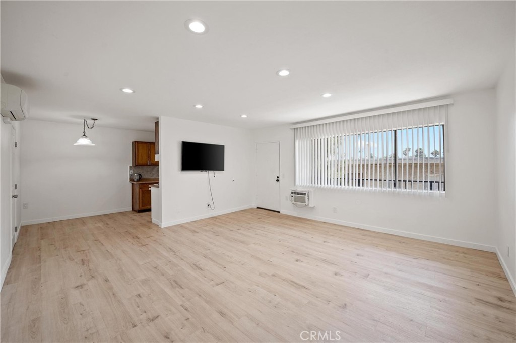Welcome to 8800 Cedros Ave Unit 204 — a bright and comfortable condo in the heart of Panorama City. This well-maintained unit features two bathrooms, hardwood floors, recessed lighting in the living room, and a newer mini-split system for efficient heating and cooling year-round. The kitchen includes a newer dishwasher and a functional layout that makes everyday living easy. Enjoy the convenience of low HOA dues and a location that’s hard to beat — just one block from a local park with a baseball field and tennis courts. Groceries, Walmart, and the Panorama City Mall are all within walking distance, giving you easy access to shopping, dining, and daily essentials. Whether you're a first-time buyer or investor, this home offers great.
