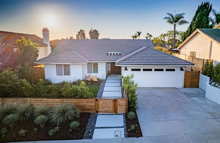 This beautifully remodeled single-story 3-bedroom, 2-bathroom home nestled in the highly desirable Village Park neighborhood of Encinitas is for the future owner who wants their family to live in style and comfort. Thoughtfully renovated from top to bottom, this move-in-ready gem features elegant polished concrete floors, a custom built out living room and den, fully renovated bathrooms and kitchen, and a custom breakfast nook that is the definition of style and convenience.  Abundant natural light fills the open living room creating a bright and airy atmosphere throughout. The primary suite offers an attached bathroom, a custom closet, doors to the backyard, a luxurious ensuite bath with a dual vanity and a stunning, newly designed shower. This home is equipped with a full array of modern upgrades, including new HVAC, a tankless water heater, and solar panels for energy efficiency. Step outside to enjoy the expansive, professionally landscaped lawn-perfect for entertaining with its outdoor tables and seating around the fire chimney. The lush lawn is ideal for relaxing under the Encinitas sun. With a low HOA of just $75/month, residents have access to a community pool, tennis courts, parks, and more. This home is ideally located just three miles from the beach. It is close to Flora Vista Elementary and other top-rated schools, shopping, dining, and easy freeway access. This gem of a home truly offers the best of modern coastal living.