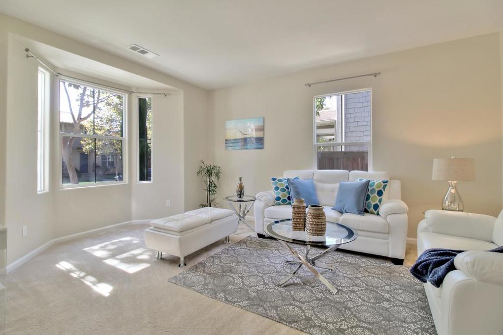 Beautiful, well lit home in one of the most desirable communities in San Ramon. Close to everything. Award winning schools, parks, shopping, restaurants, Bishop Ranch and the future San Ramon City Center. Pride of ownership. Meticulously maintained. $80,000 worth of upgrades.Granite counter tops in the kitchen with a full granite backsplash. Granite counter tops and granite tub sorrounds in all the bathrooms. Oversized, rounded kitchen island with sink. Stainless steel appliances. Showcase, lit kitchen cabinets. Built in microwave. Bay window in the living room, gas fireplace in the family room. Dining room has beautiful beams in the ceiling. One bedroom and a full bathroom on the ground level. Upgraded iron railings on the staircase. A no maintenance backyard with plenty of room for entertaining. 3 car detached garage. All clear inspection reports. Entrance to home from garage side-> North East. Home is vacant and staged.