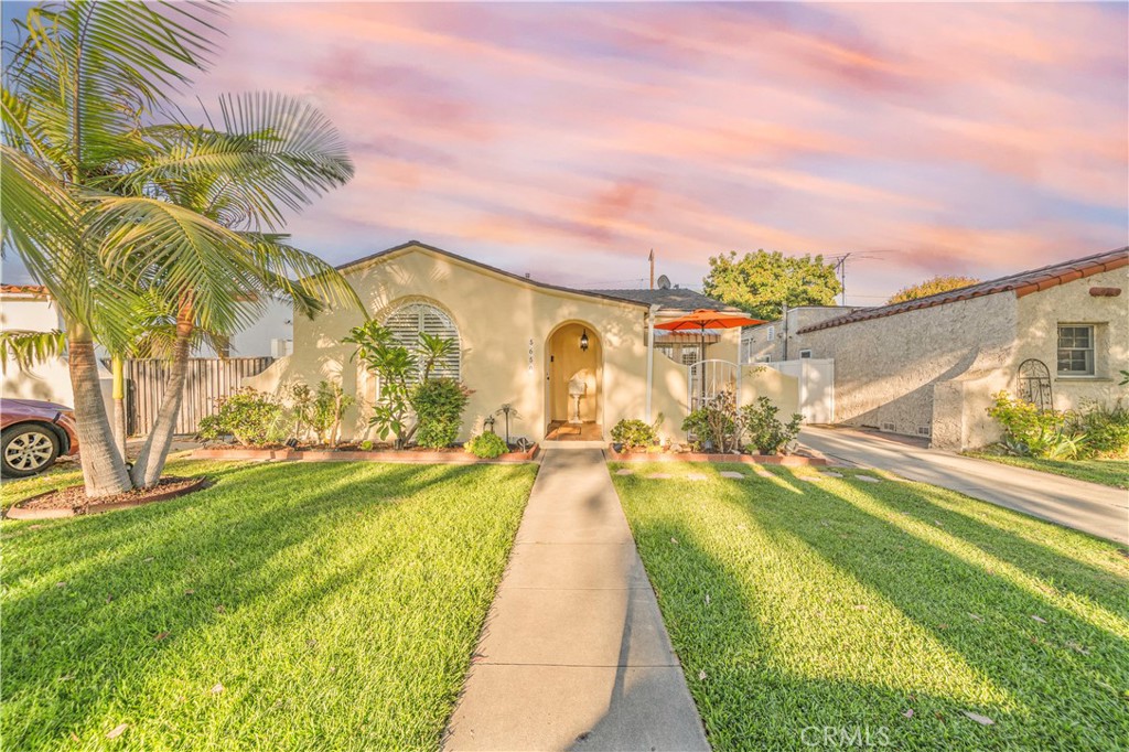 A Timeless Spanish Jewel with Modern Elegance awaiting your personal touch. Nestled on a tranquil, tree-lined street, this home offers the perfect balance of ever-chic architecture and lifestyle.
Enter into the bright and airy living room with Iconic beams, where soaring ceilings and custom plantation shutters create an elegant and welcoming space. Where you’re hosting friends or enjoying a cozy movie night on the big screen, the living room offers you the glamour of a bygone Hollywood.
A classic archway leads into the spacious dining room, bathed in natural light and offering direct access to the front porch. -perfect for your morning coffee or alfresco dining. The updated kitchen features sleek quartz countertops and a clean, modern feel- ready for you to prepare memorable meals for the upcoming holidays and beyond.
The home offers two generously sized bedrooms, each with its own walk-in closet-a rare and highly desirable feature. The remodeled bathroom adds a modern twist with white quartz tub walls, blending classic charm with contemporary style.
detached garage with finished walls — perfect for a home gym, entertainment room, creative studio, or other possibilities to suit your lifestyle. The private backyard features updated fencing, creating an ideal space for outdoor gatherings or peaceful relaxation.
Recent updates include central HVAC system, water heather, privacy fence
Minutes away from Downtown, the waterfront, Queen Mary and Aquarium of the Pacific. Enjoy the energy of the famed Grand Prix. Art lovers will appreciate nearby gems of the Museum of Latin American Art (MOLAA), Long Beach Museum of Art, and the colorful Cambodia Town. Foodies can indulge in the fine Michelin restaurants such as Heritage, The Attic, and Chiang Rai. Long Beach Airport is just a short distance away. Walking distance to schools and the largest Michelle Obama Neighborhood Library, offering a wide range of resources and services.
