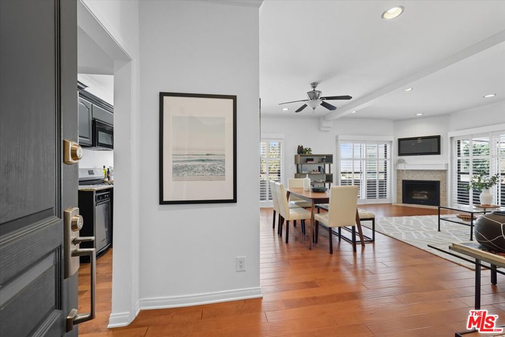 This nearly 1,500 sq. ft. condo offers the comfort & feel of a single-family home. With 3 bedrooms, 2 full bathrooms & a thoughtful floor plan, it's a rare find on the Westside for under $900K. The primary suite features a walk-in closet, double vanity ensuite bath & its own private entrance from the outdoor hallway. Two additional generously sized bedrooms share a well-appointed hallway bathroom. (Note: the third bedroom was converted- public records list the unit as a 2-bedroom + formal dining room.) Enjoy practical conveniences like a dedicated laundry room with extra storage, a wrap-around balcony & side-by-side gated garage parking. With no shared side walls- this is one of only two units on the first floor- you'll appreciate the added privacy. The building itself is a well-maintained, self-managed 8-unit complex with a brand-new roof. Central Westside location: practically across from Mar Vista Park, 5 min walk to coffee shops, restaurants & the proposed Whole Foods at Sepulveda/Palms. 10 min walk to Trader Joe's & CVS. Plus, you're just 4 miles to the beach & have quick access to the 405 & 10 freeways. Additional notes: hallway bathroom mirror is excluded (belongs to stager). Seller is doing a 1031 exchange at no cost or inconvenience to buyer.