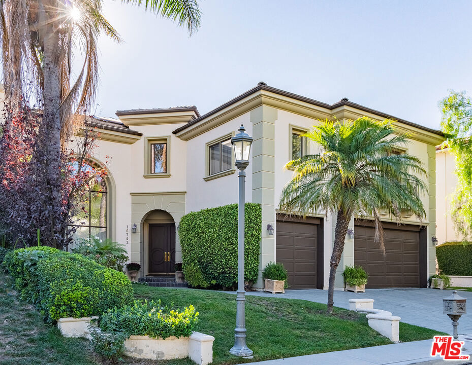 Located in the prestigious guard-gated community of The Enclave in the Palisades Highlands, this exceptional residence offers the perfect blend of elegance, comfort, and resort-style amenities. Positioned on a serene cul-de-sac, the home captures breathtaking ocean and canyon vistas while providing top-tier security and privacy. Designed for both relaxed living and sophisticated entertaining, the open floor plan showcases a chef's kitchen with Viking appliances, an inviting family room, a formal dining room with a fireplace, a media room, and a formal living room. Soaring ceilings, oversized windows, and rich hardwood floors create a light-filled, airy ambiance throughout. The home features five spacious bedrooms, including a main-level guest suite and a luxurious upstairs primary retreat with sweeping ocean views, dual spa-inspired bathrooms, and two expansive walk-in closets. Outside, enjoy seamless indoor-outdoor living with a sparkling pool and spa set against the backdrop of spectacular coastal scenery. As a resident, you'll have exclusive access to the Summit Club, offering tennis and pickleball courts, basketball courts, a fitness center, playground, pool, spa, and more, plus a nearby private dog park. This is a rare opportunity to own a home that combines views, refined design, and an unmatched Palisades lifestyle.