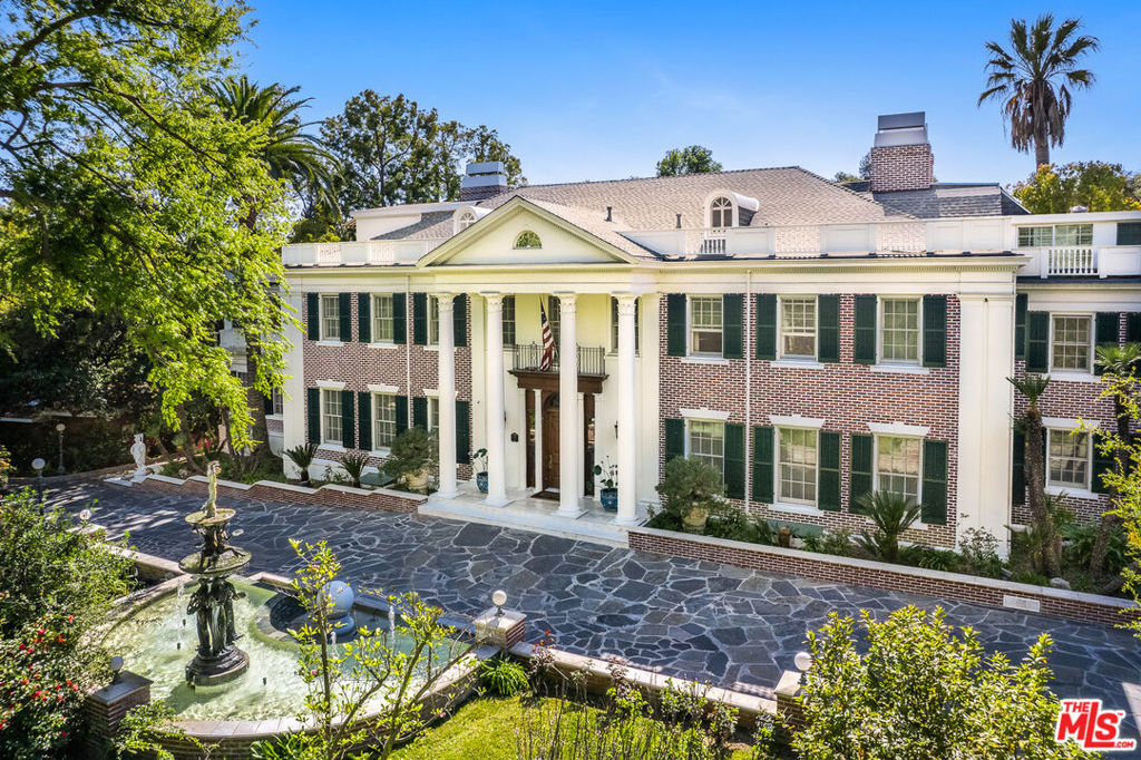 Historic 1918 Huntington Family Estate in San Marino. This irreplaceable Georgian Colonial Mansion sits on over 2 landscaped acres with over 10,000 square feet of hand-crafted living space, guest house, tennis court, 6 car garage and gated motor court. Main Residence is highlighted by an expansive entry foyer flanked by elegant public rooms, a library, a generous primary suite, home theatre, gym, wine cellar, hair salon, massage room, 3-stop elevator and much more. The grounds include a gazebo, multiple garden areas, koi pond, a lagoon pool and spa and 2-story guest house overlooking a full-size tennis court. Originally built by Henry E. Huntington for his family, this historically significant estate designed by renowned architect, Myron Hunt (Rose Bowl), presents a rare opportunity. Located within the Estate District of San Marino. LISTED BY ORDER OF U.S. BANKRUPTCY COURT. SALE IS SUBJECT TO COURT CONFIRMATION AND OVERBID.