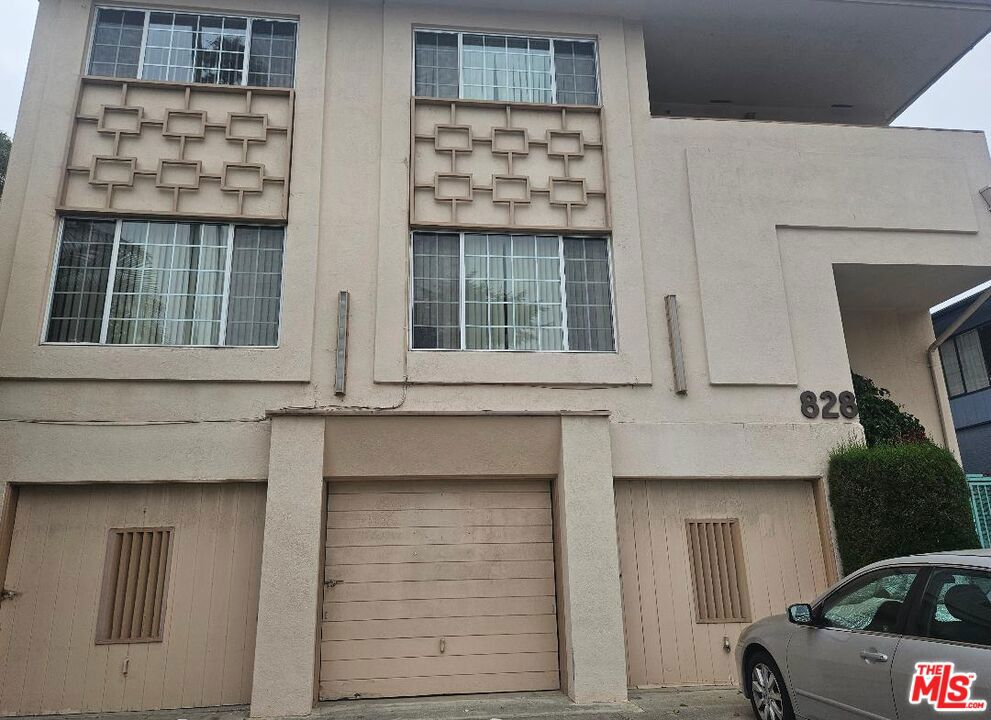 Rare find in the City of Santa Monica, located in the prime neighborhood just steps from Montana Ave, this TIC( tenants in common) 3 Bed plus den and 2.5 bathrooms unit just few blocks from the ocean. Split level townhouse with living room, den, kitchen and half bathroom on the lower level and 3 bedrooms, 2 bath on the upper level. Bring your imagination and make this unit a showcase. Individual garage with one parking space and second space as tandem. The complex is adjacent to a village-like array of shops, grocery, specialty, etc. The price reflects the current condition of the unit. Cash only.