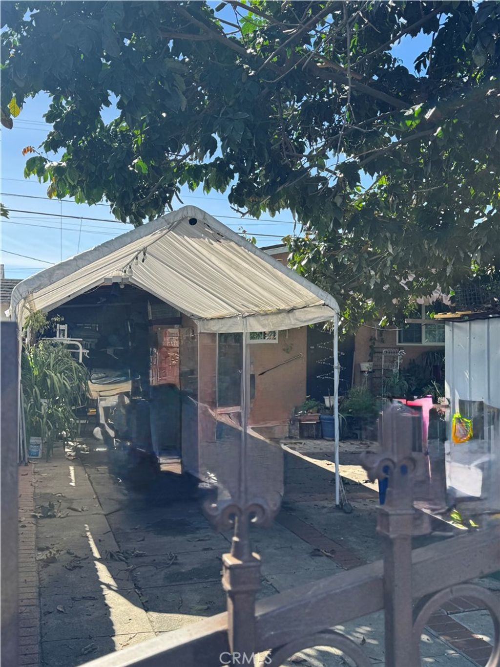 Photo of 1140 W 66th St, Los Angeles, CA 90044 (MLS # DW26036729)