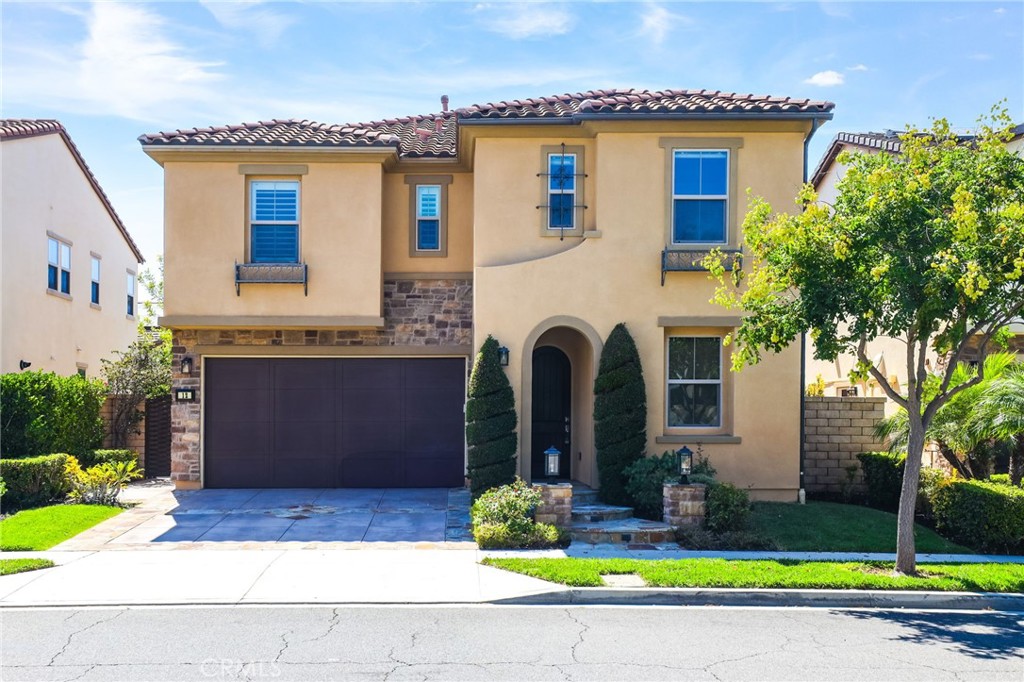 Located in the Prestigious Resort Style Community of Baker Ranch, this Stunning 4 Bedroom Turn-Key Residence is Fully Upgraded and Impeccably Designed for the Modern Buyer. Offering Designer Finishes, this Model Quality home will have you in awe from the moment you step through the front door. Gorgeous Neutral Toned Wood Floors, Soaring Two-Story Ceilings and a Light & Bright Interior bathed in Natural Light. Continue into the Open Concept Great Room featuring Built-In Speakers, Custom Built-In Entertainment Center, Dining Area and Beautiful Glass Door Slider Creating Quintessential California Indoor/Outdoor Living. The Stunning Chef’s Kitchen has it all featuring Designer Pendant Lights, Beautiful Upgraded White Cabinets, Stainless Steel Appliances w/Built-In Refrigerator, Gas Stove, Water Filtration, Artisanal Tile Flooring, Granite Countertops, Spacious Walk-In Pantry and Large Center Island w/Bar Seating. The highly desirable Downstairs Bedroom w/Full Bathroom provides incredible flexibility and convenience for any family. Upstairs you will find the Spacious Laundry Room, 3 Additional Bedrooms and the Charming Multi-Purpose Loft. Unwind & Relax in the Tranquil Spacious Primary Suite Retreat featuring an Abundance of Natural Light leaving you well rested and calm. Ease Yourself into a New Wellness Routine in your Spa-Like Primary Bathroom featuring Dual Vanities, Quartz Countertops, Restorative Glass Walk-In Shower w/ Custom Designer Tile Accents, Neutral Tile Flooring and His & Her Walk-In Closets w/ Custom Closet Organizers. The Backyard Oasis is accessed through Fully Upgraded Covered California Room with Built In Speakers and Custom Tile Flooring. The Tranquil Water Feature and Custom Landscaping are Ideal for Year Round Entertaining. This Residence features a Spacious 2 Car Attached Garage w/Epoxy flooring, storage, and an extended driveway. Ideally located just a short walk to Resort Style Amenities including Hiking Trails, Swimming Pool, Tennis Courts & Clubhouse…Beautiful Home..This is the One!