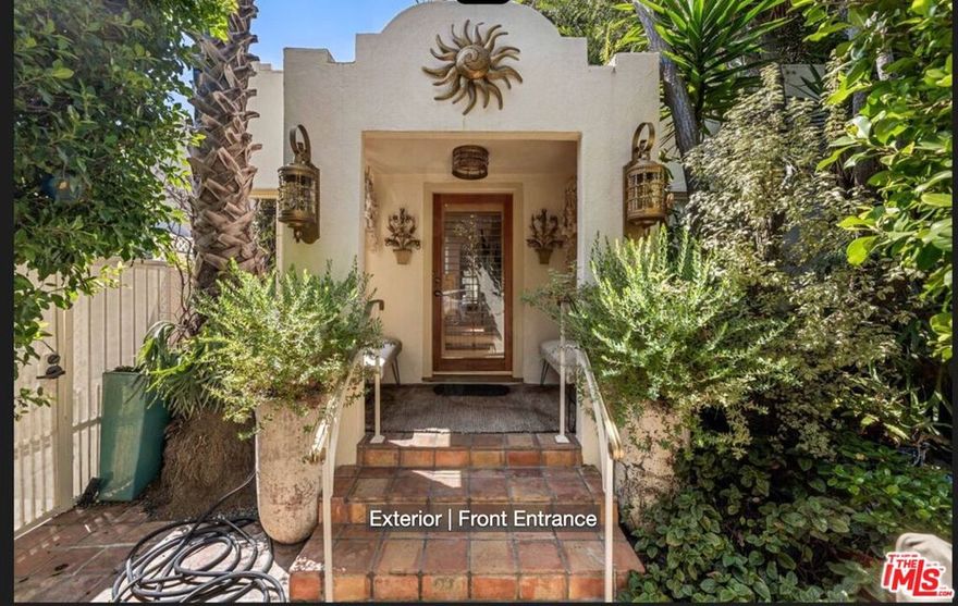 Experience a rare opportunity to lease a piece of Hollywood history at 9060 Harland Avenue  the legendary former home of Dolly Parton. Set in one of Los Angeles' most vibrant and iconic neighborhoods, this fully furnished 2-bedroom, 2-bath residence blends classic charm with modern comfort, all just moments from world-famous Melrose Avenue and Santa Monica Boulevard. Located in the heart of West Hollywood's Design District, the home offers effortless access to shopping on Melrose Place, popular restaurants, and an array of boutique shops, cafes, and nightlife. This coveted neighborhood is known for its walkability, creative energy, and long-standing ties to entertainment and cultural history. Inside, the open-concept living area is filled with natural light and stylish finishes, flowing into an updated kitchen with stainless steel appliances and designer tile. The serene primary suite features a king bed, seating area, walk-in closet, ensuite bath, and direct access to the lush backyard. The second bedroom is perfect for guests or a home office, complete with its own private covered balcony. Outdoor spaces include a tropical-inspired patio and covered deck ideal for dining and entertaining. Additional features include hardwood floors throughout and an in-home laundry room. This exceptional home offers privacy, character, and proximity to some of LA's most celebrated destinations - an ideal retreat for those relocating, renovating, or seeking a refined and historic place to call home.