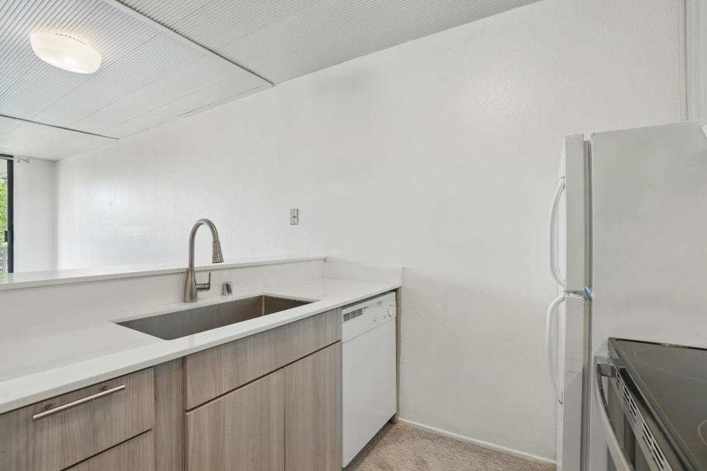 A top-floor studio facing South, blending comfort and convenience! Recent updates include new carpet and the kitchen features new countertops, cabinets, a stainless steel faucet, electric glass top range and range hood. Enjoy all the amenities Shelter Creek has to offer: three pools (2 outdoor, 1 indoor), hot tub, gym, sauna, tennis courts, and clubhouse with pool tables and ping pong tables. Close to YouTube and Walmart campuses, Bayhill Shopping Center, SFO, Caltrain, BART, I-280, I-380 and US-101.